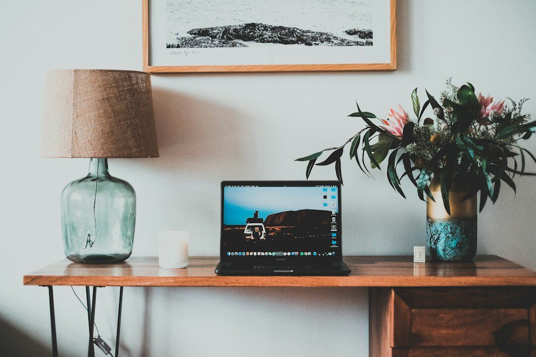 Laptop on a desk showing an analytics dashboard