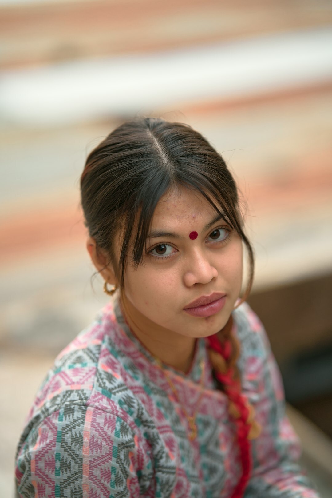 Studio portrait of a South Asian British woman in her 40s